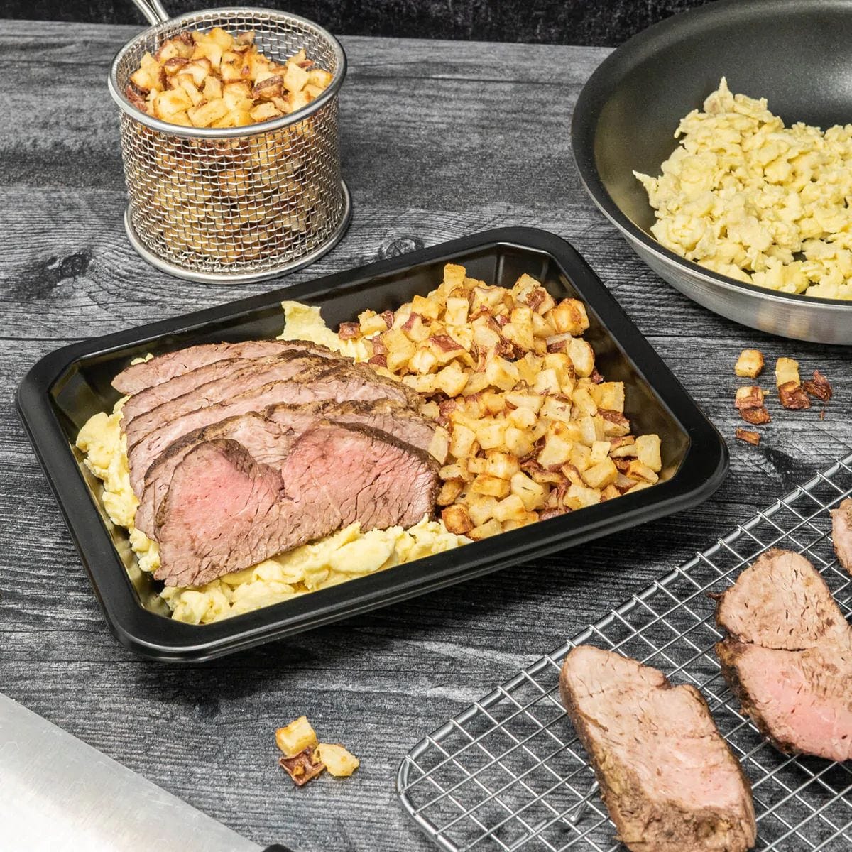 A protein-rich steak and egg hash, a key meal for breaking a weight loss plateau.